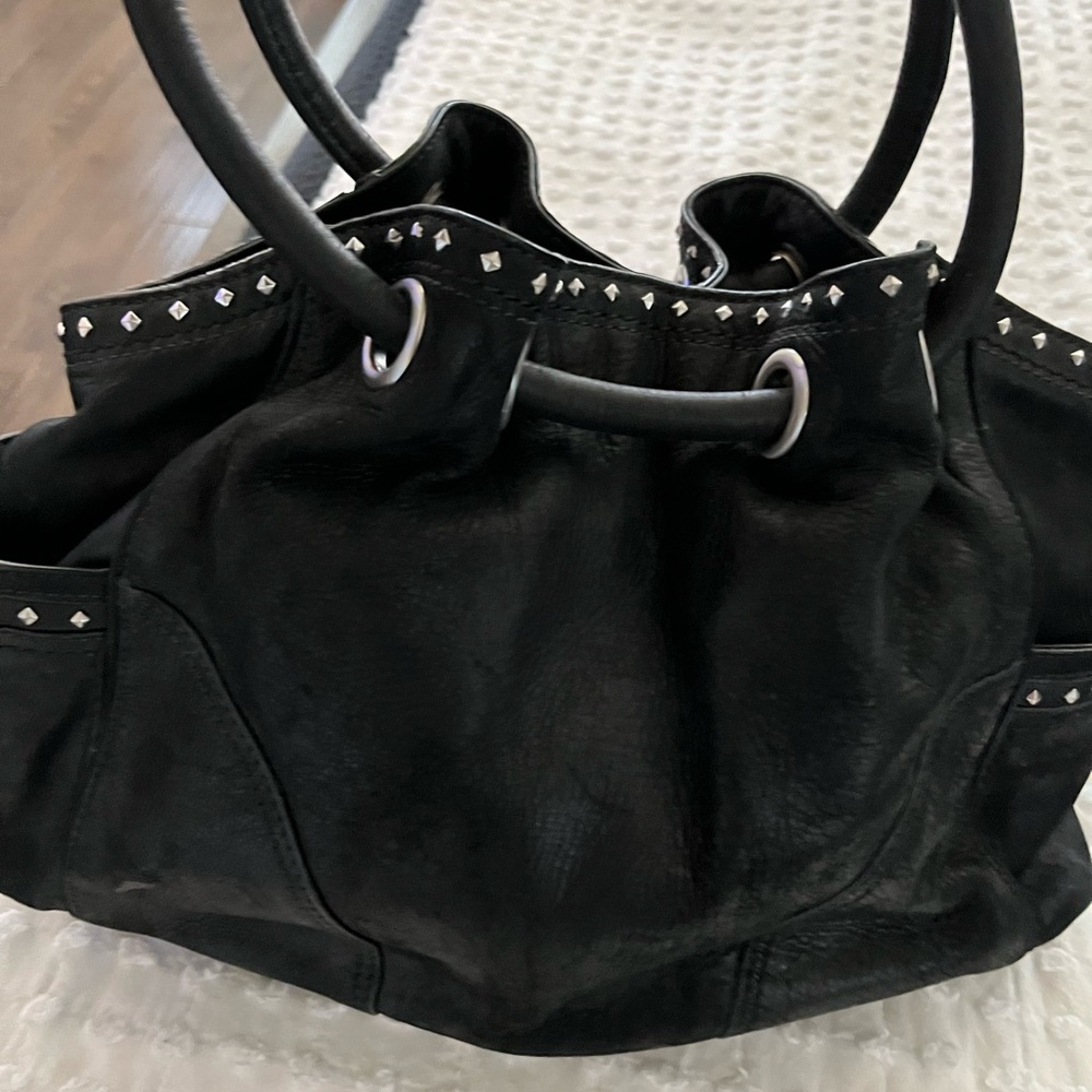 Black leather studded Cole Haan handbag and wallet